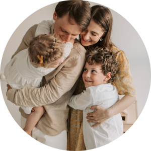 Family hugging after saving money with member perks
